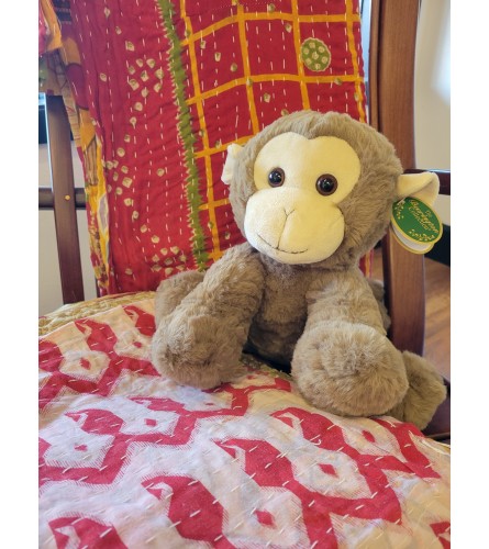 Giggles The Monkey. An arrangement by Thurston Flowers.