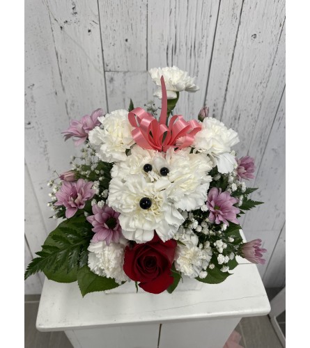 Paws and Kisses. An arrangement by Incredible Florist.