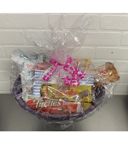 Chocolate Lover's Gift Basket (pink and purple) - Deluxe. An arrangement by The Flower Box Florist.