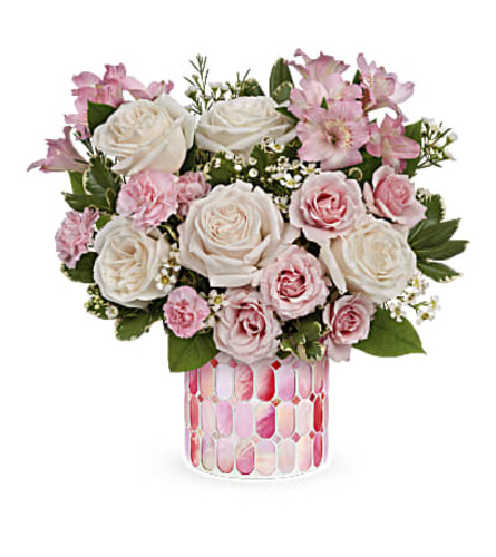 Teleflora's Sweet Clouds - Deluxe. An arrangement by Mae's Flowers and Gifts.
