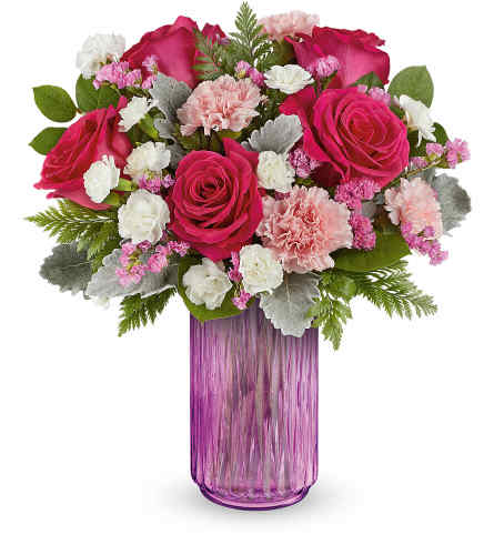 Teleflora's Pink Glow Bouquet - Deluxe. An arrangement by Sueppel's Flowers.