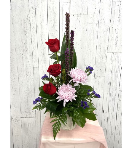 Blooming Bliss. An arrangement by Red Rose Incredible Florist.