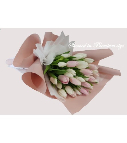 Gentle Grace Tulips - Deluxe. An arrangement by Geni's Florist and Gifts.