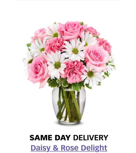 Daisy and Rose Delight. An arrangement by Butterflies Flower Shop.