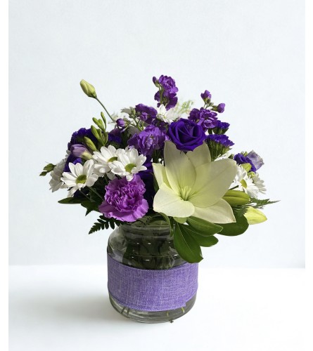 Amethyst Blooms. An arrangement by Goodman's Florist.