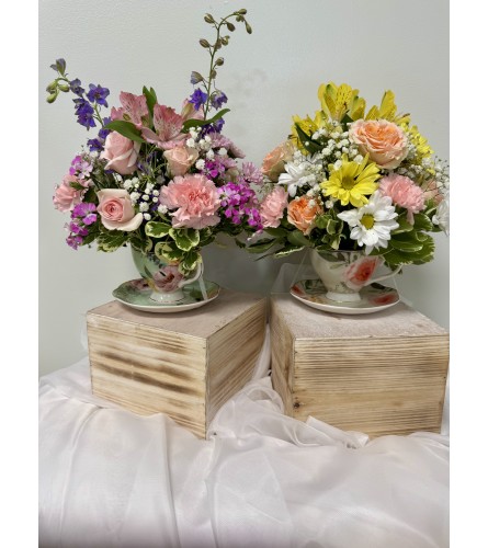 Blossoms in a Teacup. An arrangement by M's Flowers.