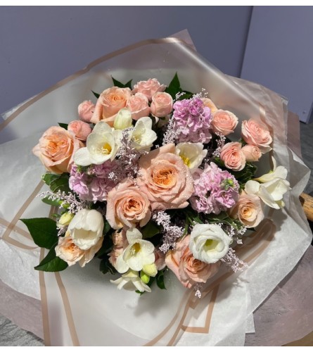 Peach Blossom Whisper. An arrangement by Petals.