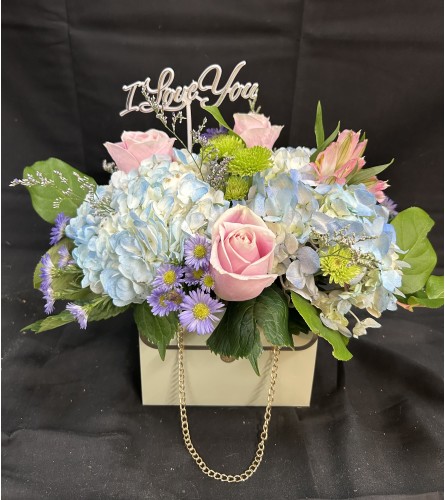 Enchanted Pastel Charm. An arrangement by Flowers by Neil.