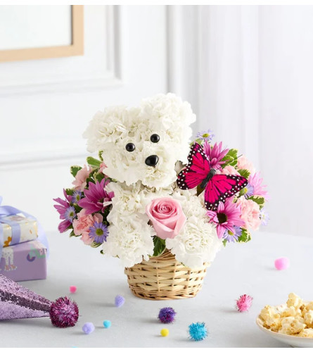 Precious Pup. An arrangement by Palmetto Gardens Florist.