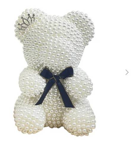 White pearl teddy bear (Small). An arrangement by New Bloominghill Flowers.