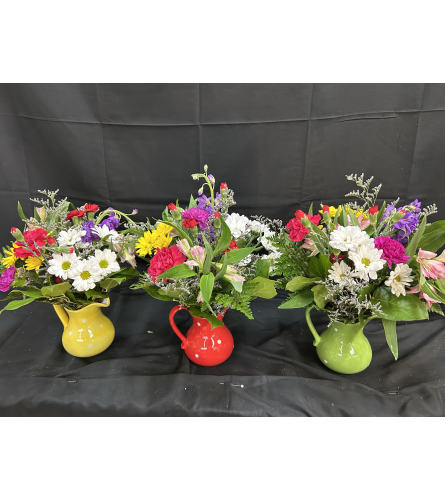 Petal Parade Pitcher. An arrangement by Flowers by Neil.
