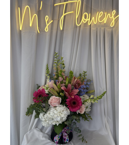 So Lovely 25. An arrangement by M's Flowers.