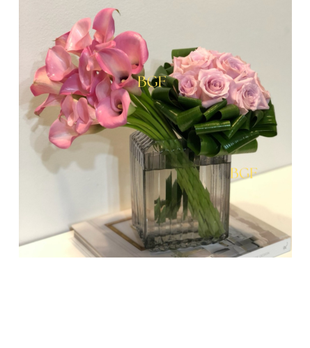Roses with Pink Cala. An arrangement by Doral Flower District and Design.