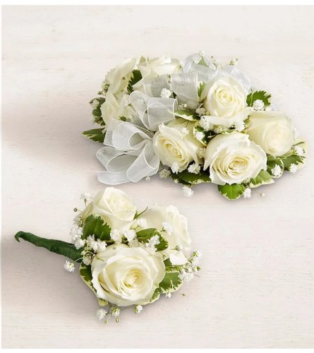 White Boutonniere and Corsage. An arrangement by Brickell Ave Florist.