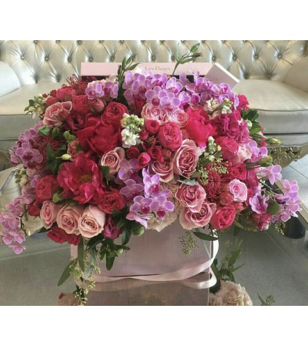 Enchanted Bloom Box. An arrangement by Berlin Flower Shop.
