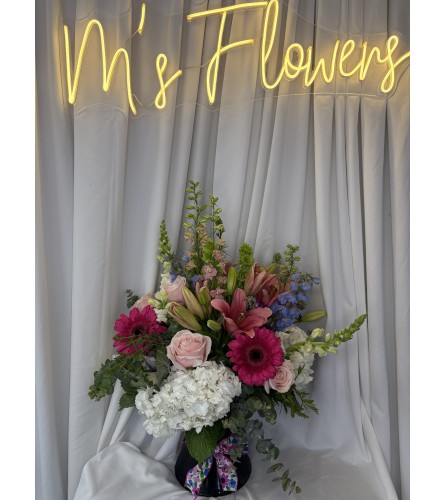 SO LOVELY 2025. An arrangement by M's Flowers.