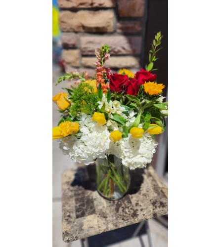 Sunshine Special Flower Arrangement. An arrangement by Flowers by Girlfriends.
