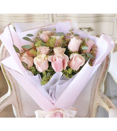 In love with Wrap - Deluxe. An arrangement by Brickell Ave Florist.