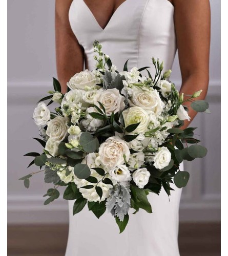 Wedding Classic white bridal bouquet. An arrangement by Timp Valley Floral.