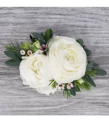 Wedding or prom elegant ranunculus wrist corsage. An arrangement by Timp Valley Floral.