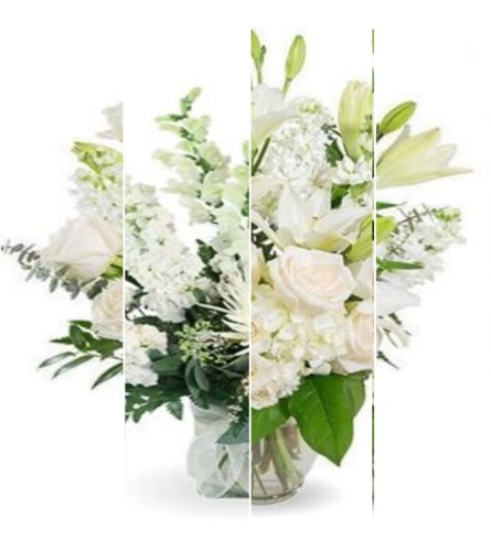 White Florist Choice - Deluxe. An arrangement by Hiram Flower Shop.
