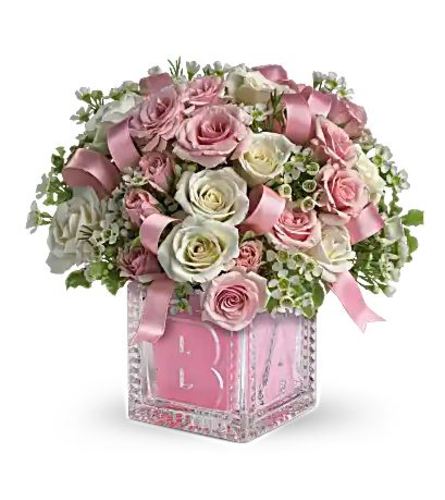 Baby's First Block by Teleflora - Pink. An arrangement by Believe Flowers.
