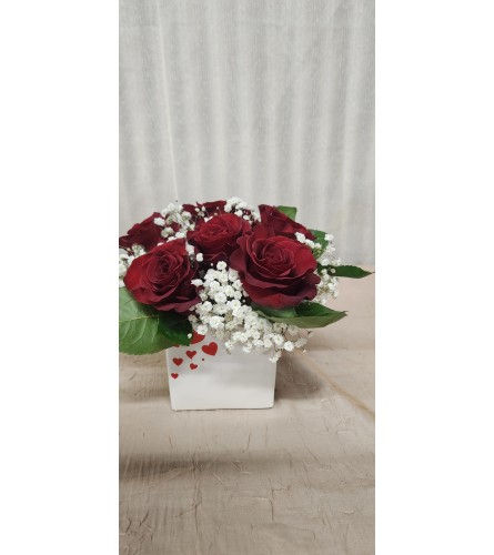 Heartfelt Rose Embrace. An arrangement by Special Touch Florist.