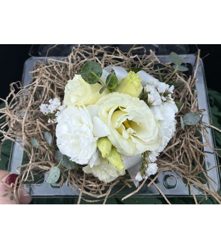Simply Sweet Corsage. An arrangement by The Dogwood Tree.