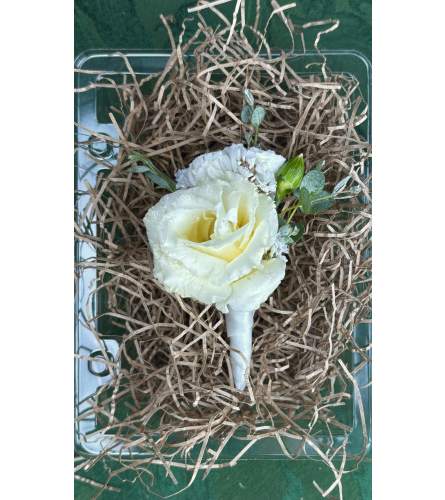 Simply Sweet Boutonniere. An arrangement by The Dogwood Tree.