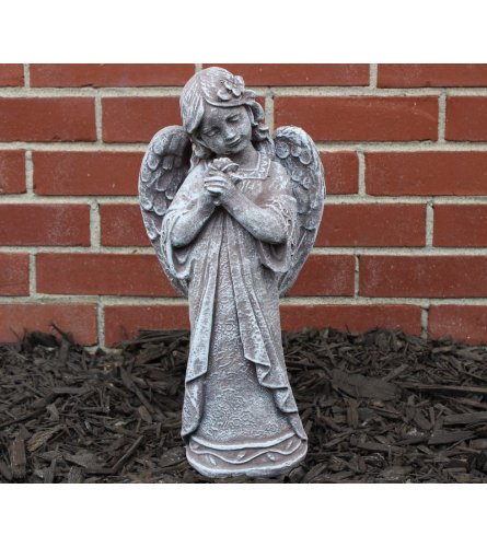Statue - Rose Angel. An arrangement by Tom Rodgers Flowers.