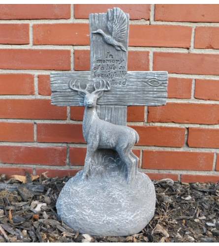 Statue - Hunting Cross. An arrangement by Tom Rodgers Flowers.