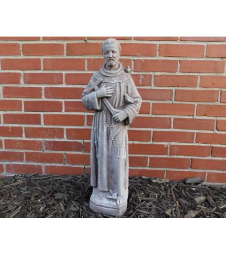 Statue - St. Francis. An arrangement by Tom Rodgers Flowers.