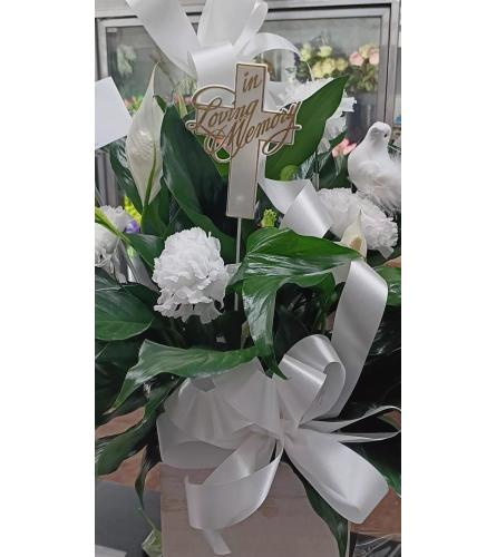 PEACE and SYMPATHY. An arrangement by Howard Beach Florist.