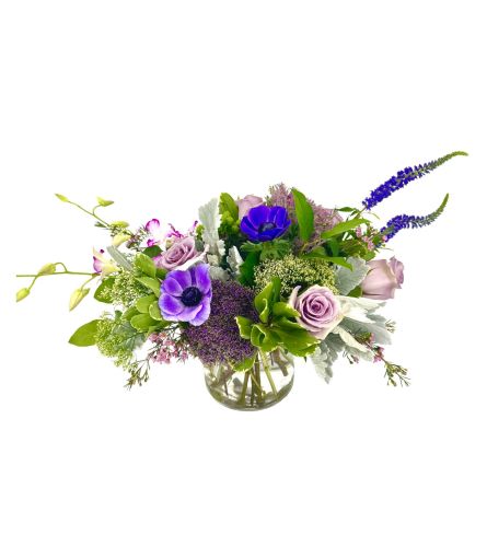 Purple Palooza. An arrangement by Flowers of Jacksonville.