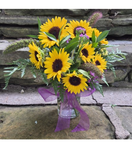 Pocketful of Sunshine. An arrangement by Thompson's Full Bloom.