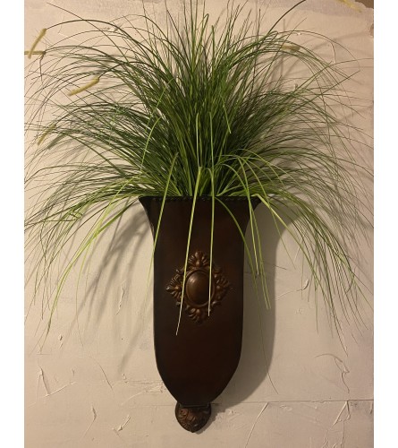 Wall Sconce - Deluxe. An arrangement by The Flower Box Florist.
