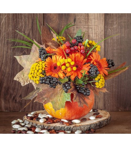 COUNTRY PUMPKIN. An arrangement by A Loving Touch Florist.