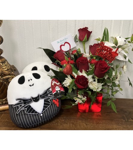Spirited Birthday Greetings for a Special Ghoul Friend. An arrangement by The Flower Box Florist.