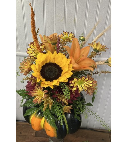 Rustic Pumpkin Charmer. An arrangement by The Flower Box Florist.