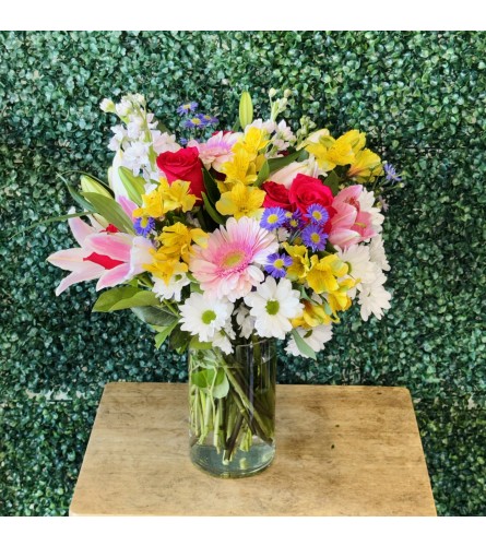 Garden Of Happiness. An arrangement by Flower World and Gifts.