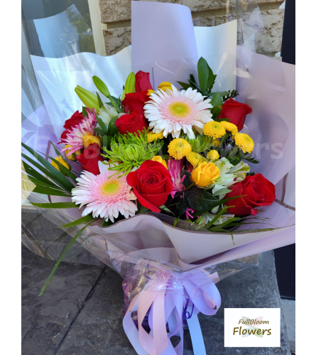 Sunshine and Rose Delight. An arrangement by FullBloom Flowers.