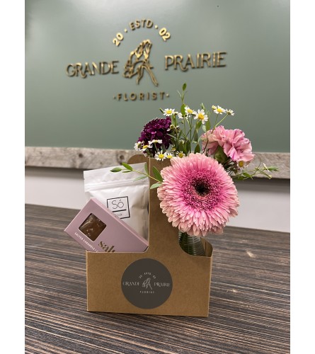 Petals and Pamper. An arrangement by Grande Prairie Florist.
