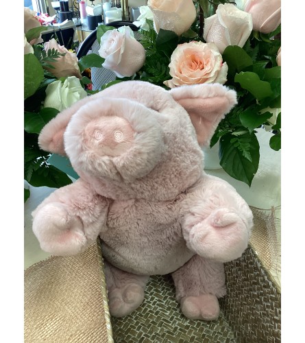 Pink Piggy Warm Buddy. An arrangement by Roma Flowers and Gifts.