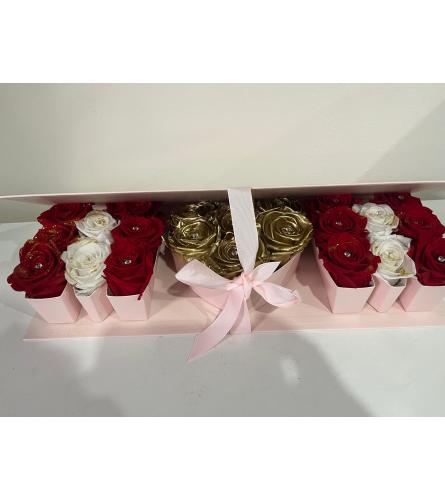 Box Mom flowers preserved. An arrangement by Livanna Basket Shop.