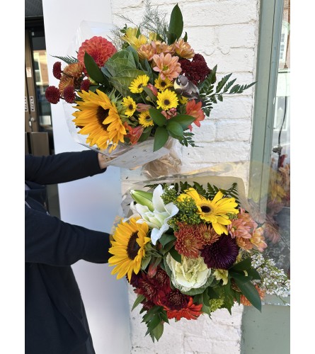 Handtied Florist Choice Fall Arrangement. An arrangement by Napanee Blooms.