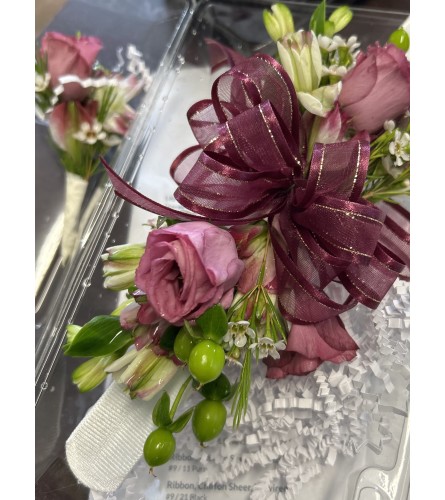 Winter Whispers Corsage - Deluxe. An arrangement by Lily Pad Florist.