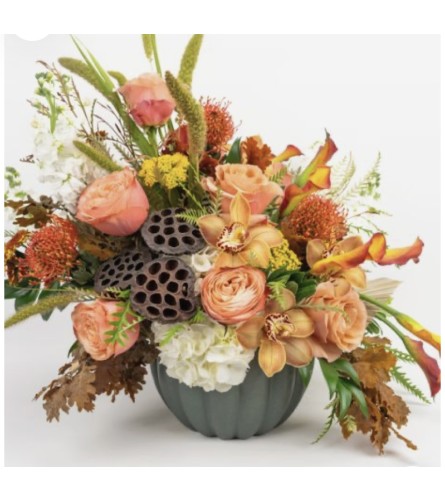 Blush and Ember Delight. An arrangement by The Flower Box Florist.