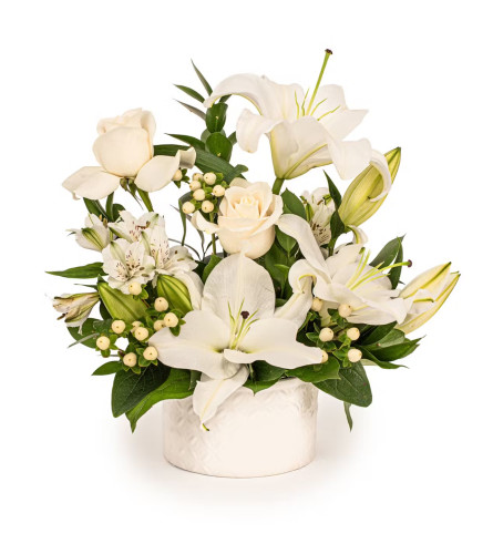Graceful Remembrance. An arrangement by Flowers and Beyond.