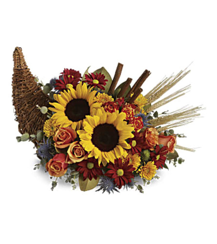 Warm Wishes Cornucopia - Deluxe. An arrangement by Flore's Shop.