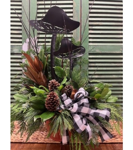 Outdoor Festive Winter/Evergreen Arrangement. An arrangement by Forest Florist.